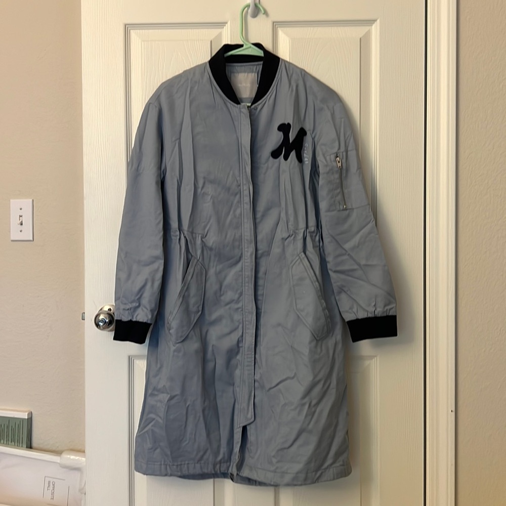 Long blue varsity coat with extra layer